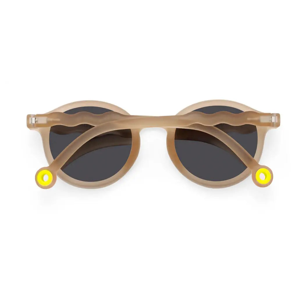 Olivio & Co Oval Sunglasses Junior+ Classic Olivio Sand Beige with dark lenses and wavy bridge detail