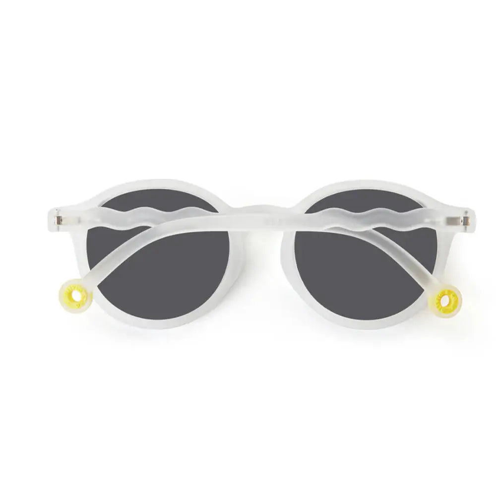 Olivio & Co Oval Sunglasses Kids, Jellyfish White; front view shows white frames with dark lenses and yellow ring accents