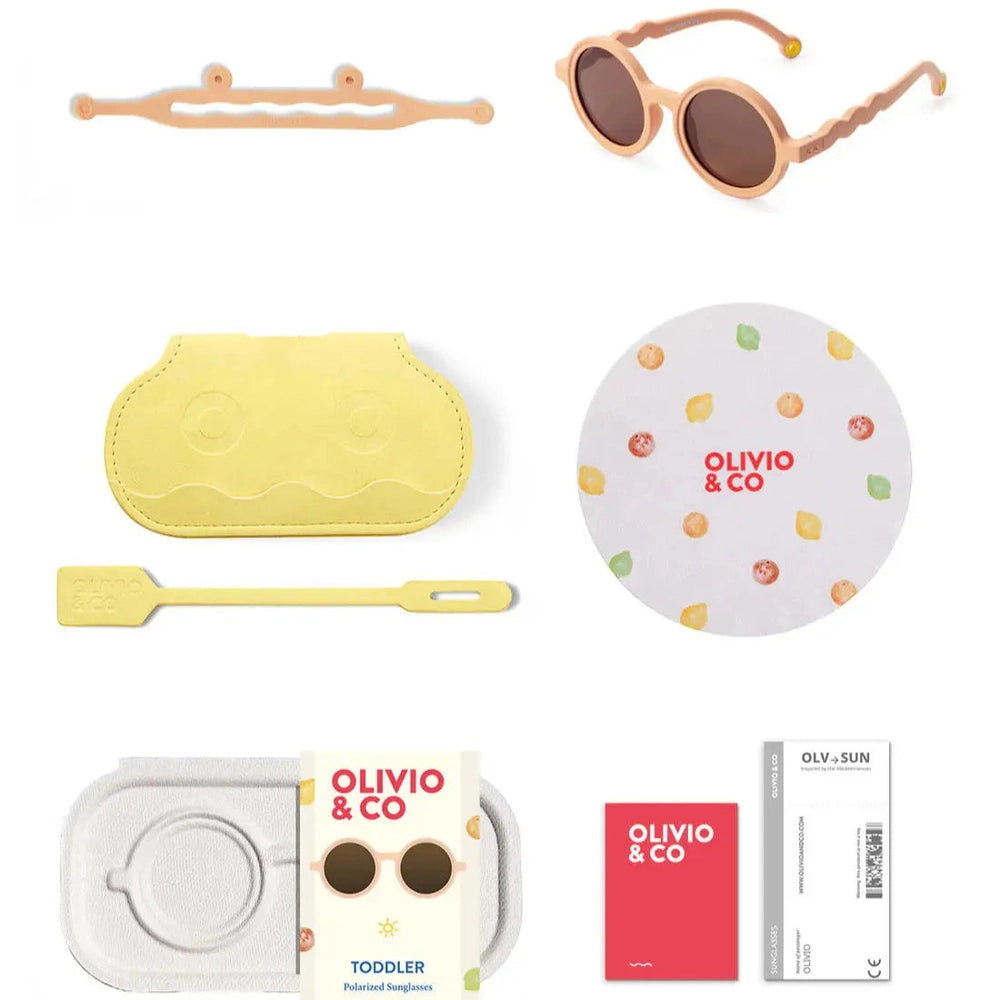 OLIVIO & CO round kids sunglasses in grapefruit pink with yellow case and matching citrus-pattern accessories set