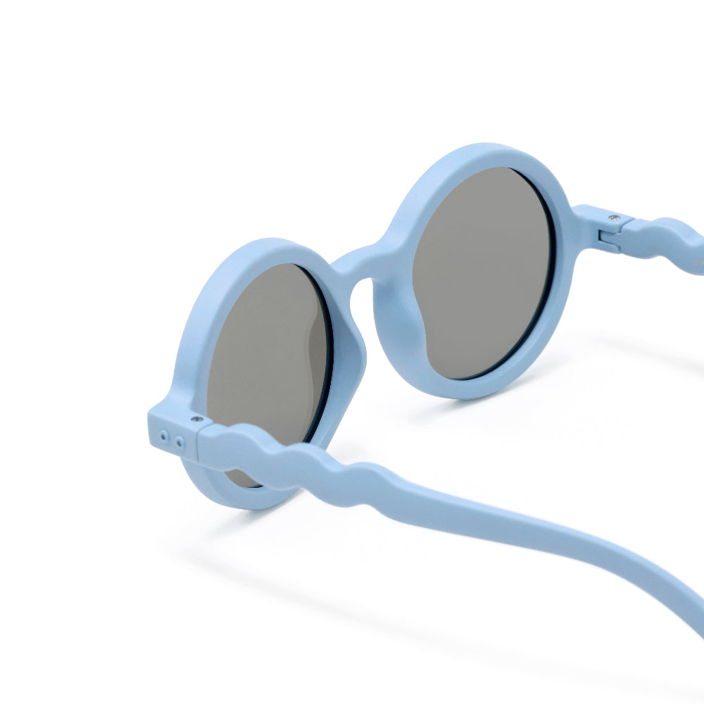 OLIVIO & CO Round Kids Sunglasses Glacier Blue with mirrored lenses, arms extended on a clean white background.