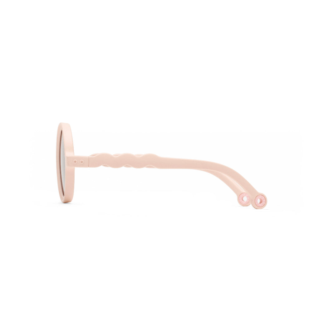 Olivio & Co Round Sunglasses Kids Classic Olivio Shell Pink shown in side profile with wavy pink temples