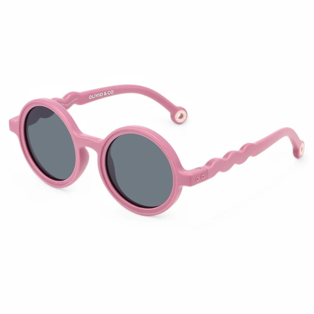 Olivio & Co round kids sunglasses in pink Flower Stall Rock Rose frame with dark lenses and wavy arms