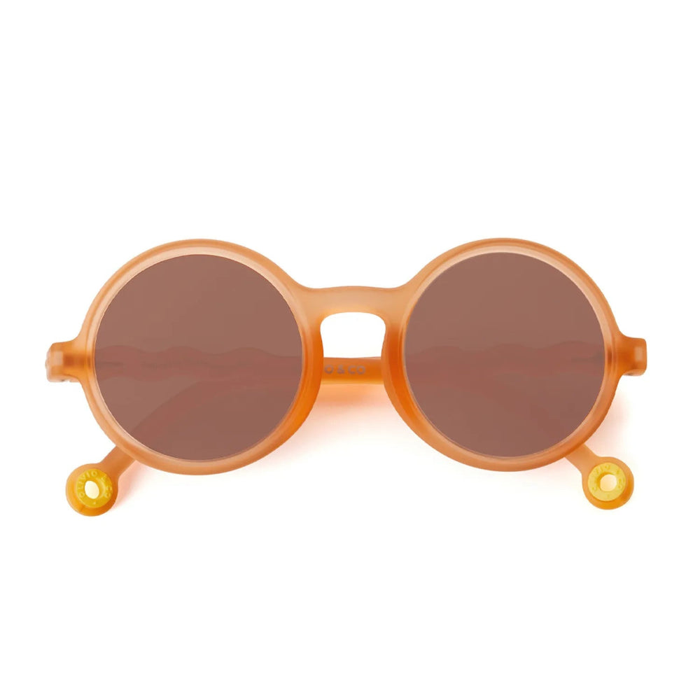 Olivio & Co Round Sunglasses Kids Citrus Garden Grapefruit Pink with orange frame and brown lenses, front view.
