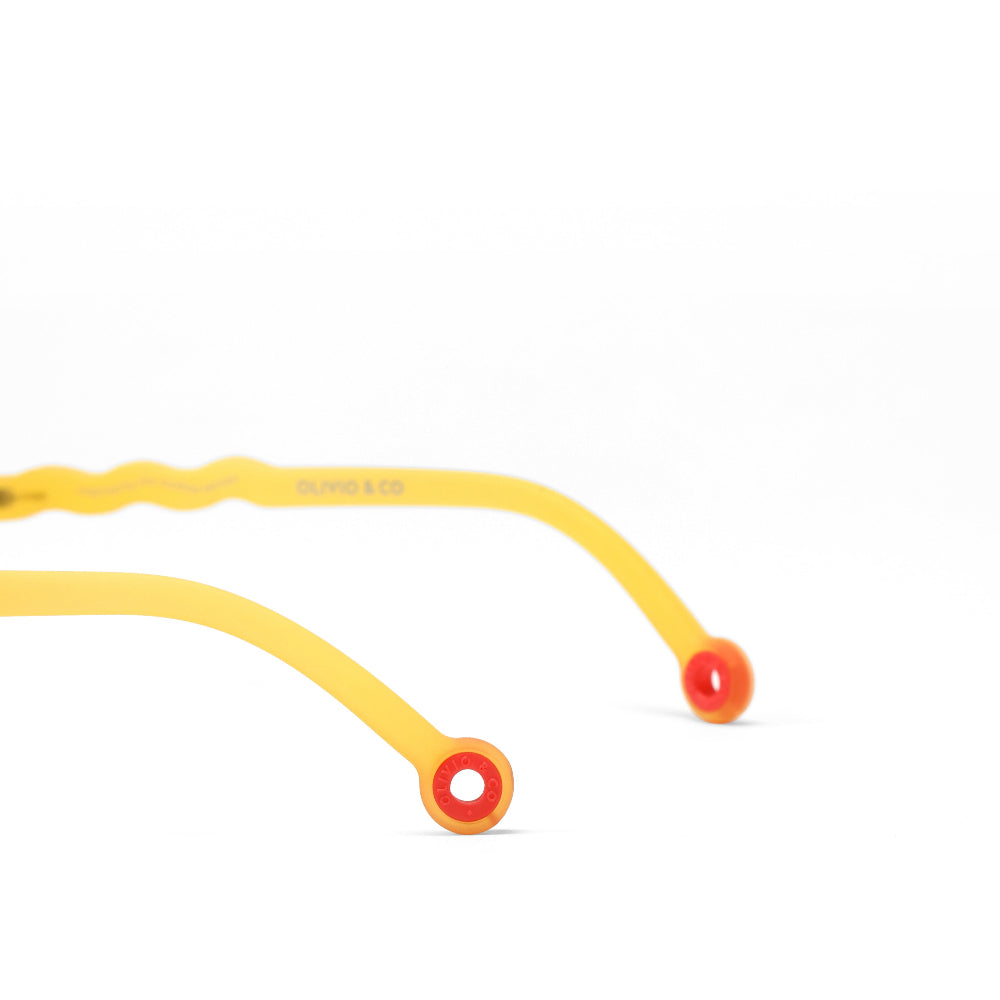 Olivio & Co round kids sunglasses in yellow with red temple tips (2 arms)