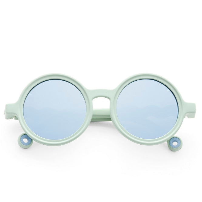 Olivio & Co Round Sunglasses for Kids with natural light green frames and blue mirrored lenses reflecting the sky