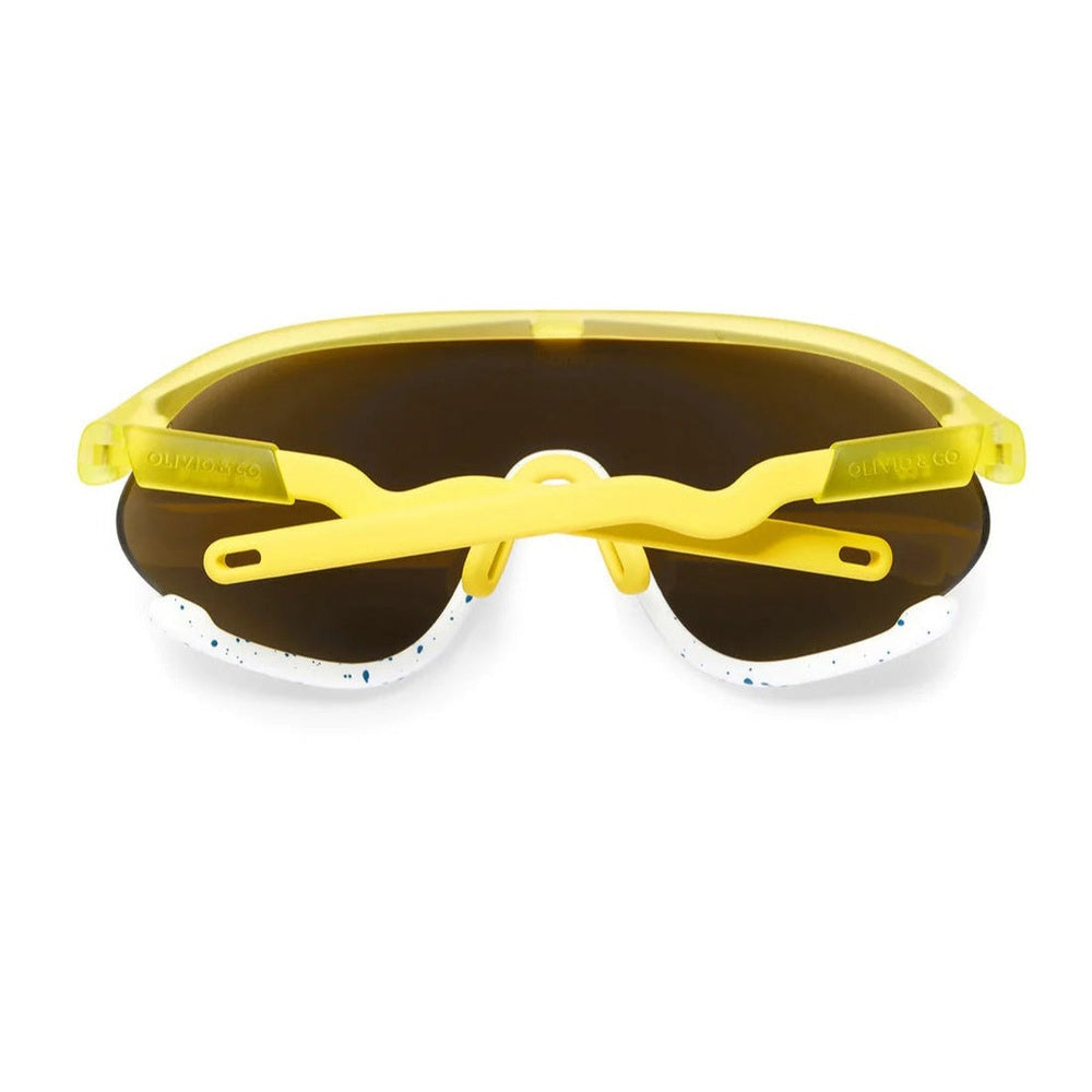 Olivio & Co Sport Sunglasses Junior+ Full-Rim Daisy Soda; front view shows yellow frame, brown lenses, and white speckled accents