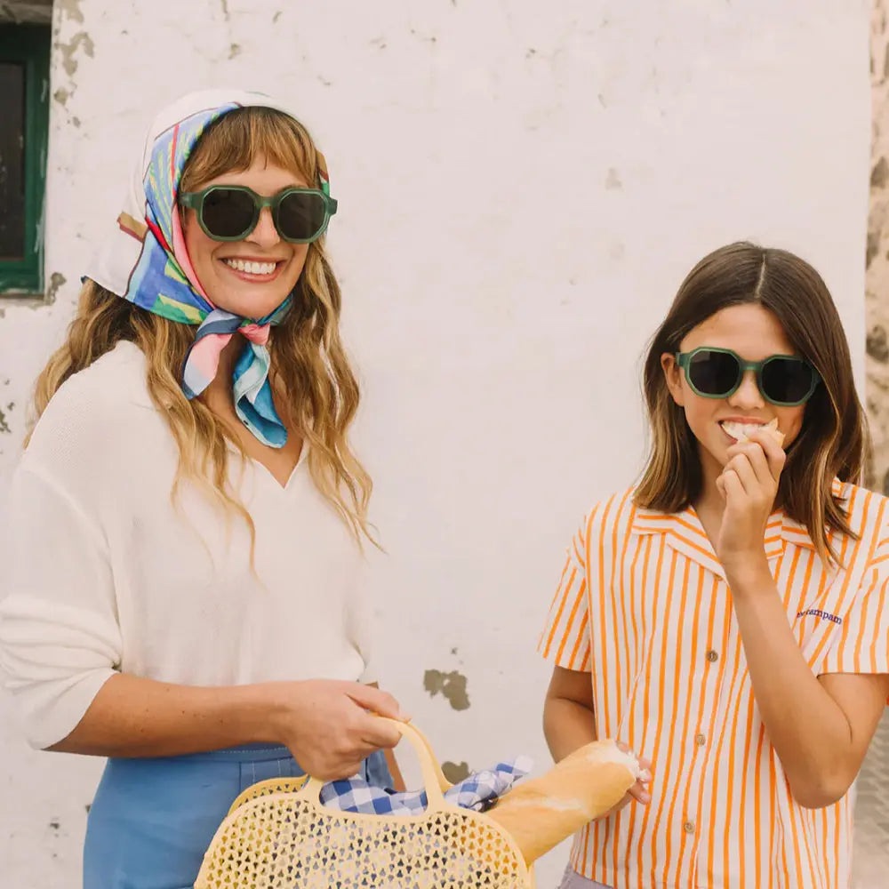 Olivio & Co Square Sunglasses Adult Creative Edition Olive Green worn by two smiling women outdoors, highlighting square frames.