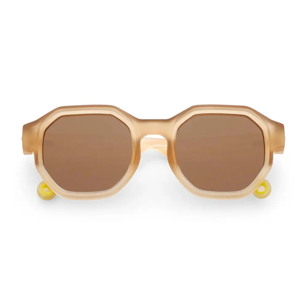 Olivio & Co Square Sunglasses Kids Creative Edition D Desert Sand with brown lenses in translucent desert‑sand frame.