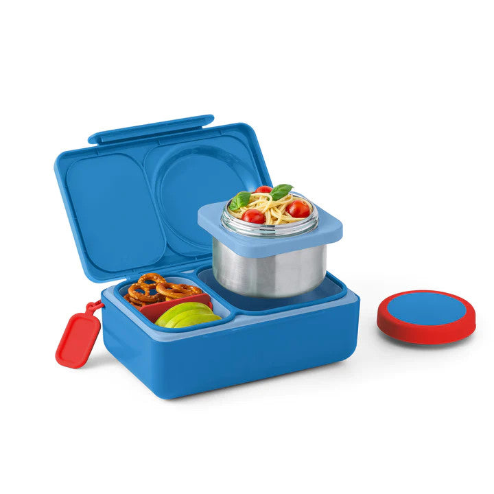 Omielife Omiebox Up blue lunch box with stainless steel container; pasta served, fruit and snacks in compartments, red lid off.