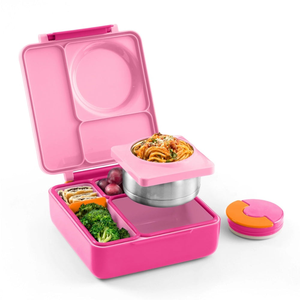 Omiebox Version 2 pink lunch box with three compartments; top insert holds pasta, showing hot-food capability.