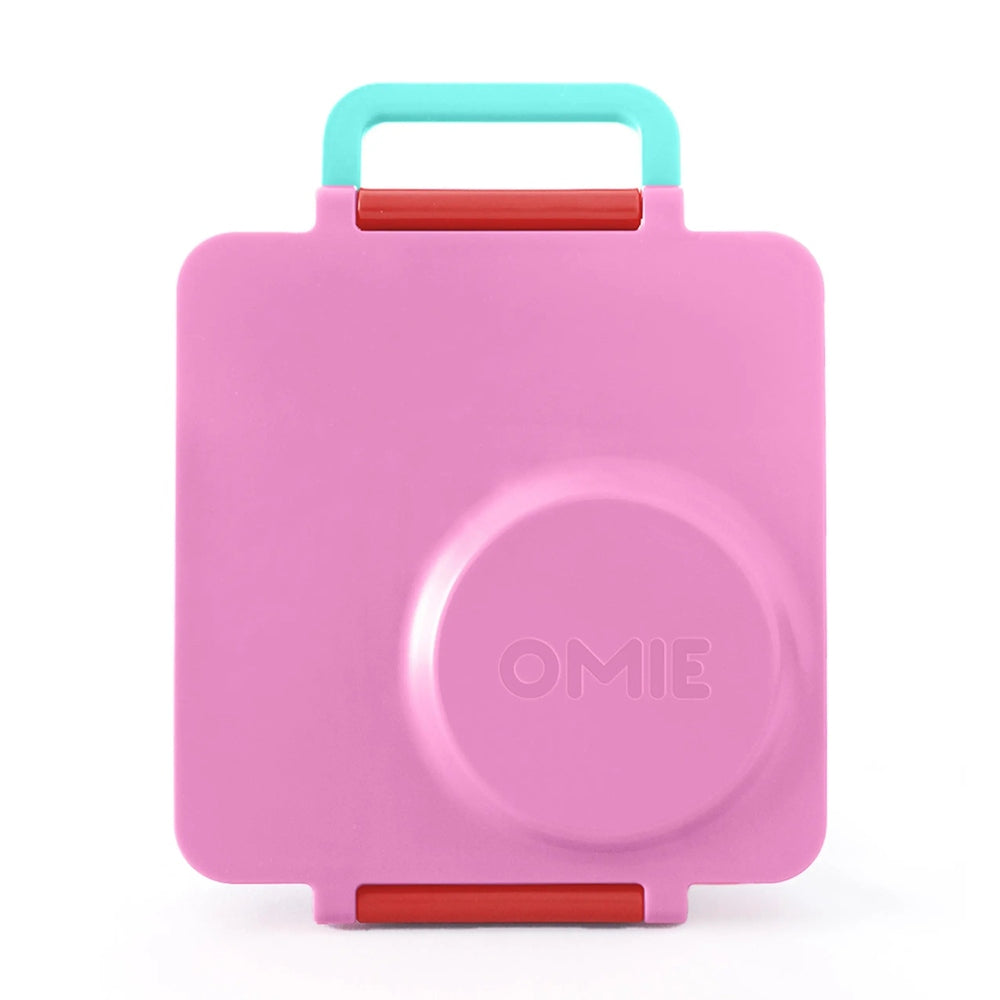 Omiebox Version 2 lunch box in pink with teal handle and red latches, closed and ready to carry