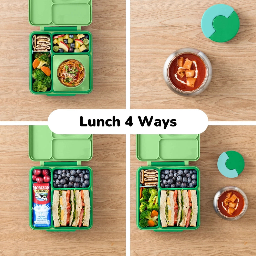 Omiebox Version 2 lunch box, green with four compartments, packed with pasta, fruit, veggies, and sandwiches.