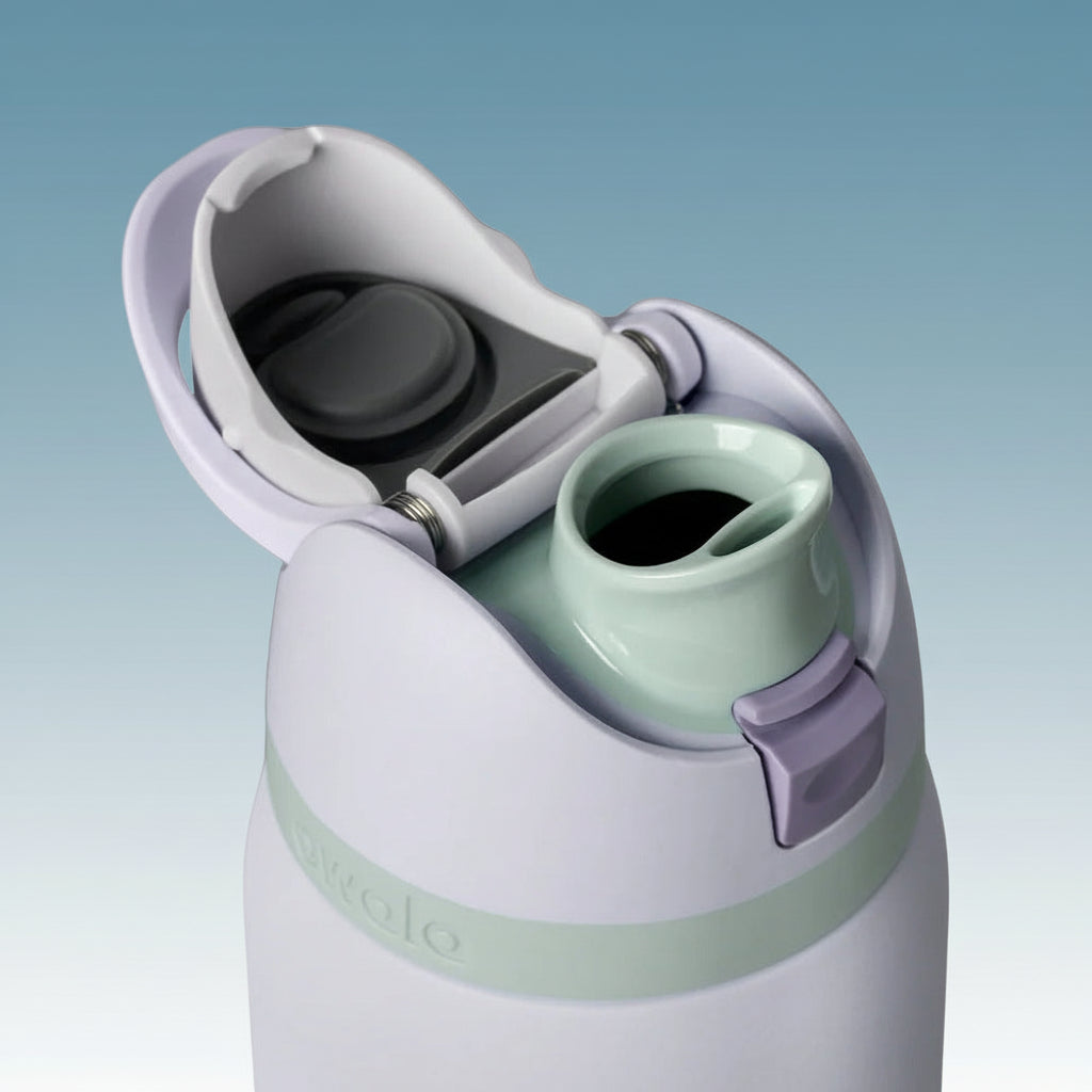 Close-up of a green and purple water bottle with a white cap on a white background