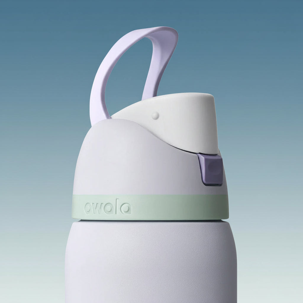 White and green water bottle with a purple handle on a white background