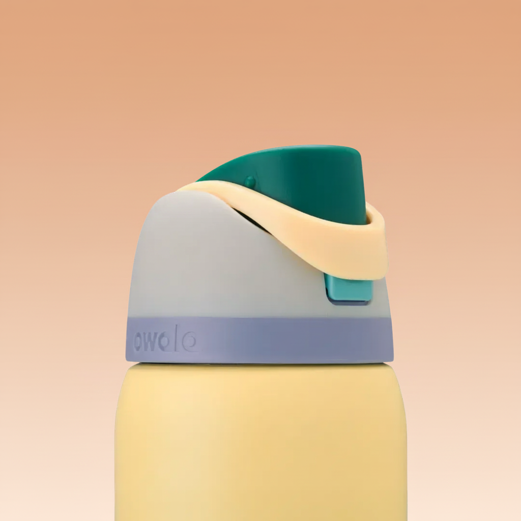 Colorful water bottle with a multicolored cap on a white background