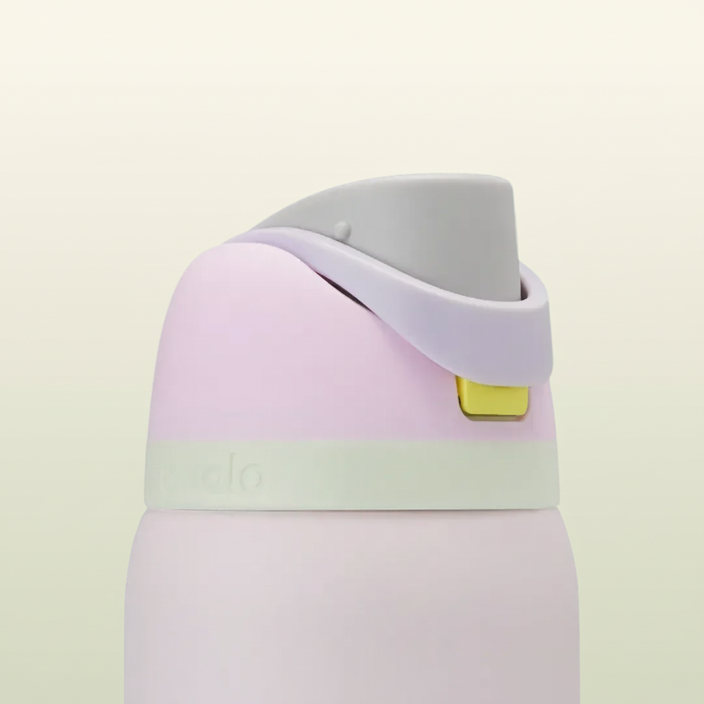 Pink water bottle with a gray cap and yellow label on a white background