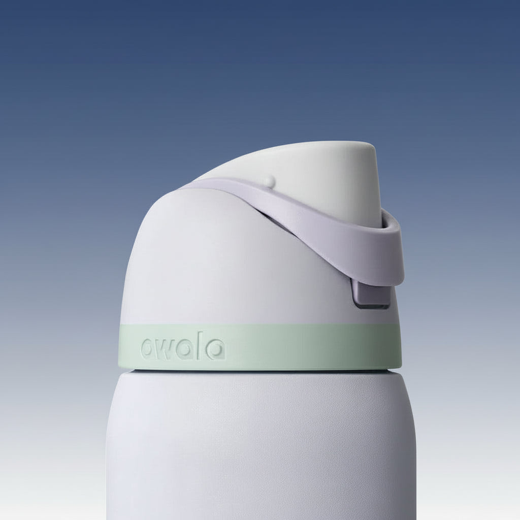 White and green water bottle with a strap on a white background