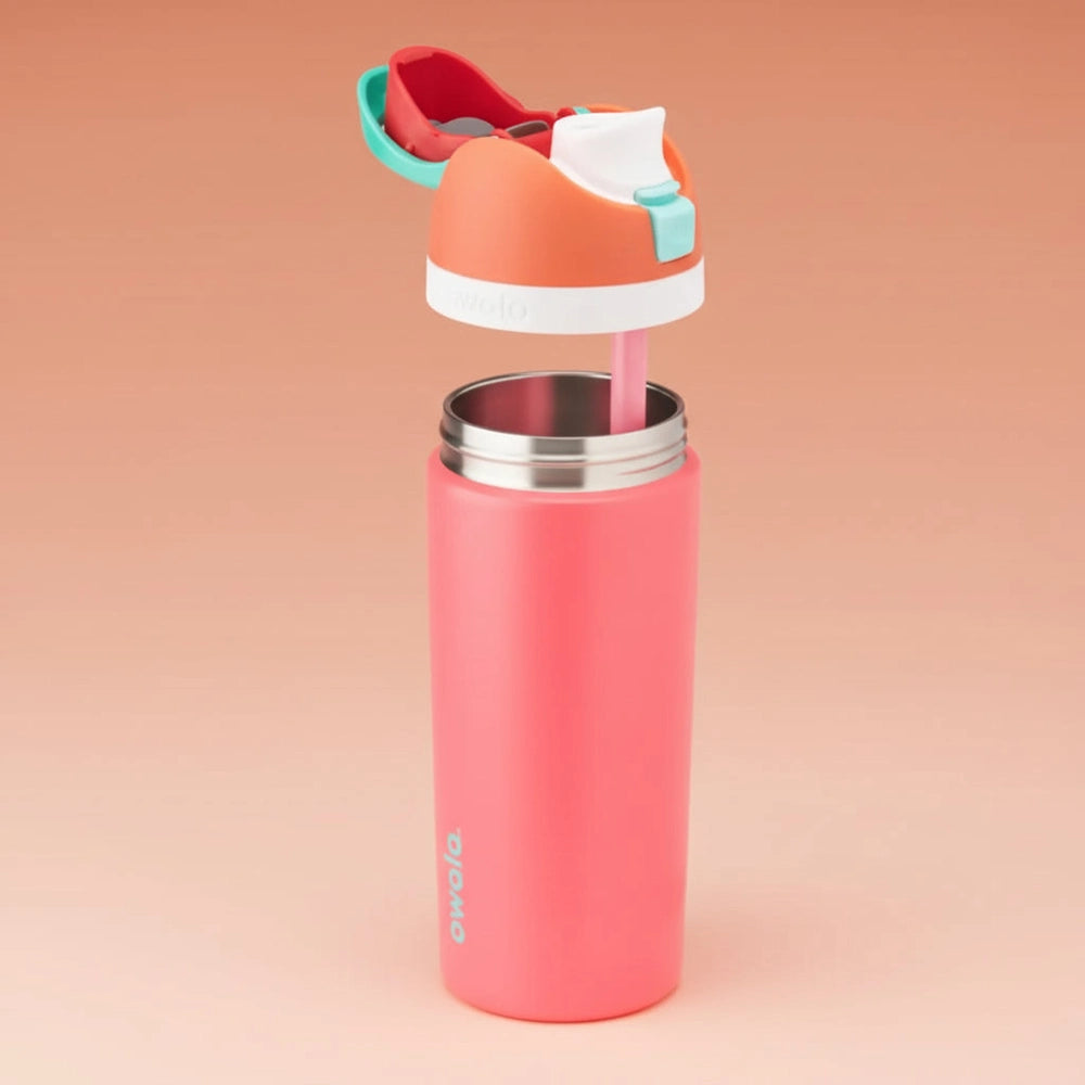 Pink water bottle with colorful lid on a white background