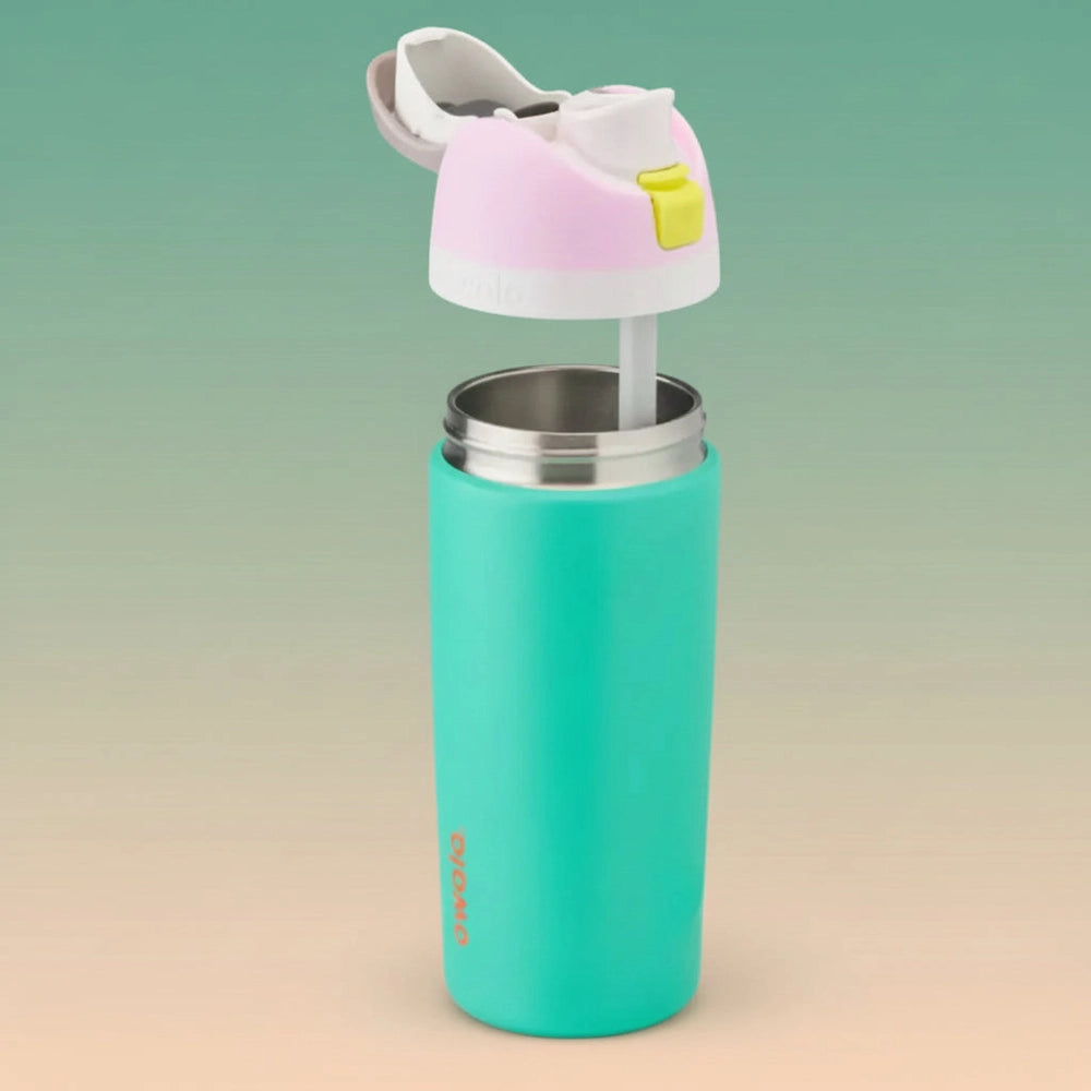 Turquoise tumbler with a pink and white lid on a white background