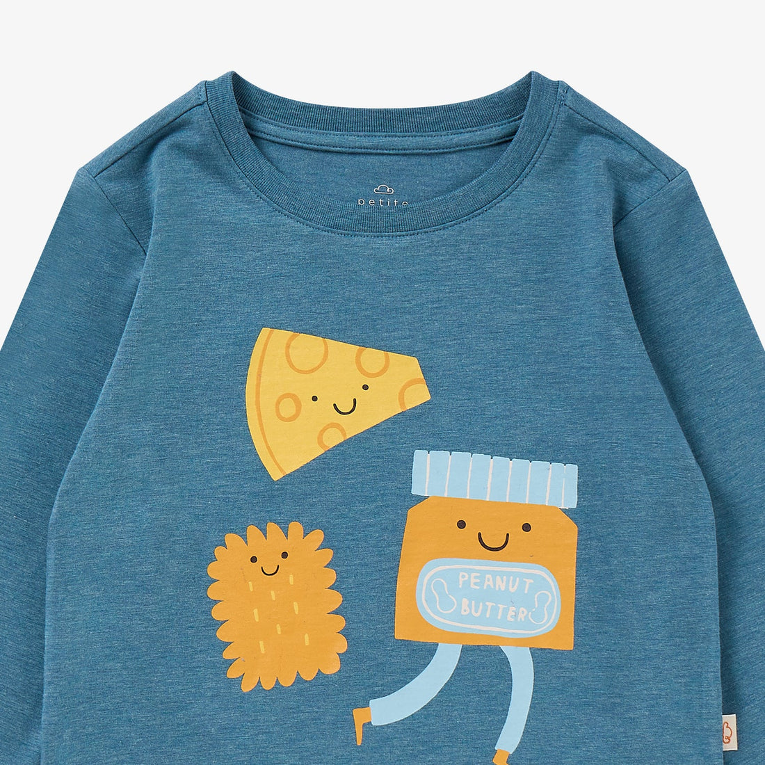 Nest Designs Munchies Long Sleeve Tee in Oceanview blue, close-up of the crew neck and cheese character print