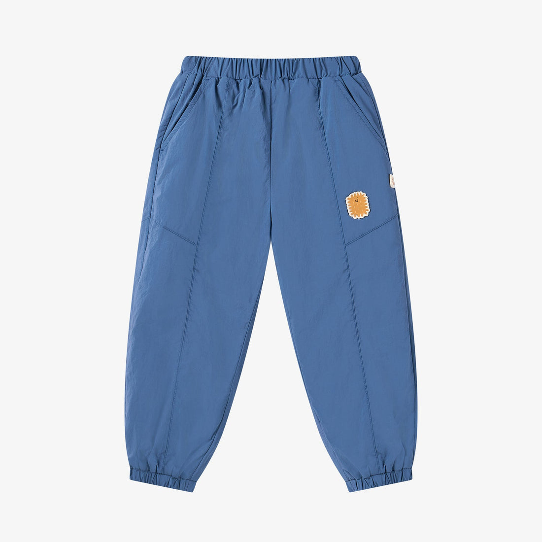 Nest Designs Biscuits & Vine Pants in Sea Blue, full front view with elastic waist, side pockets, and golden patch