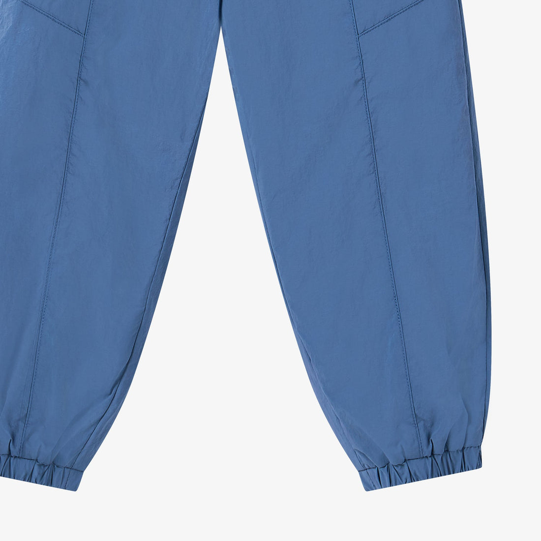 Nest Designs Biscuits & Vine Pants in Sea Blue, lower-leg detail showing tapered shape and elastic ankle openings