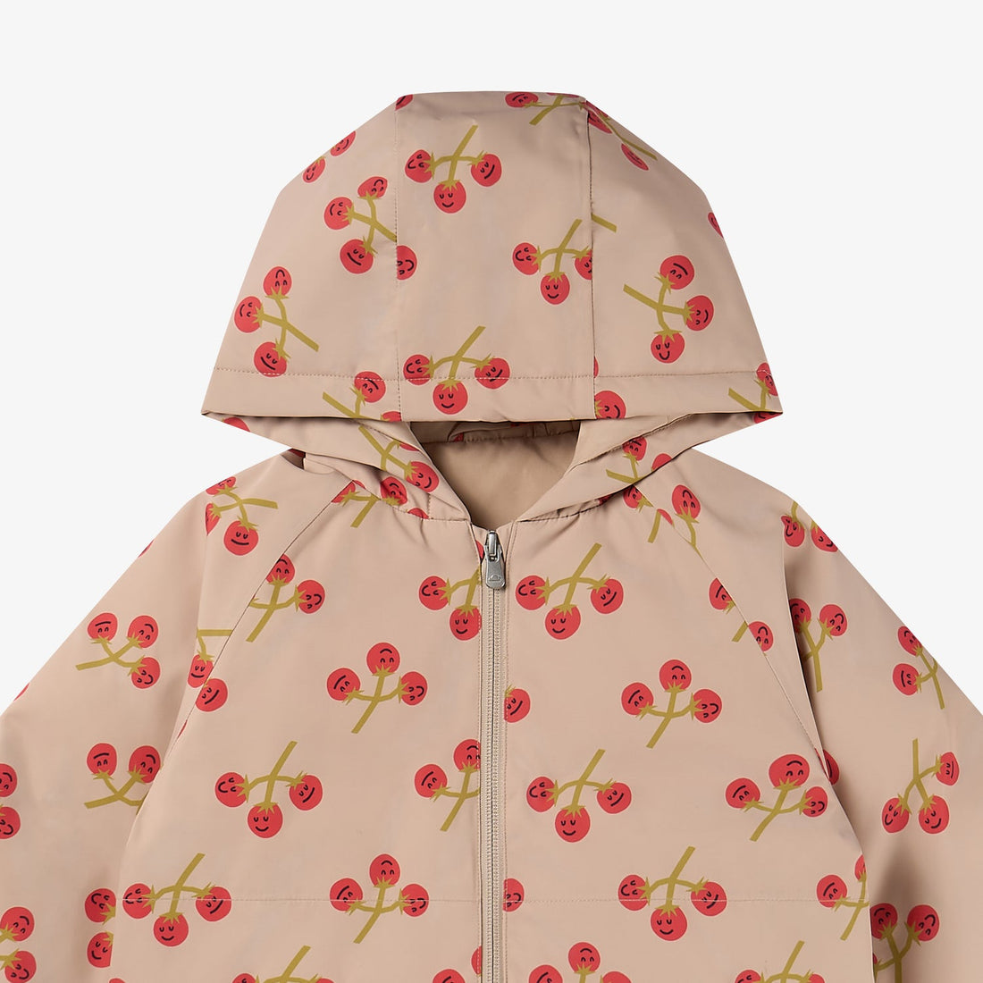 Nest Designs You're So Vine Waterproof Down Jacket hood close-up showing the cream shell with red cherries and green stems