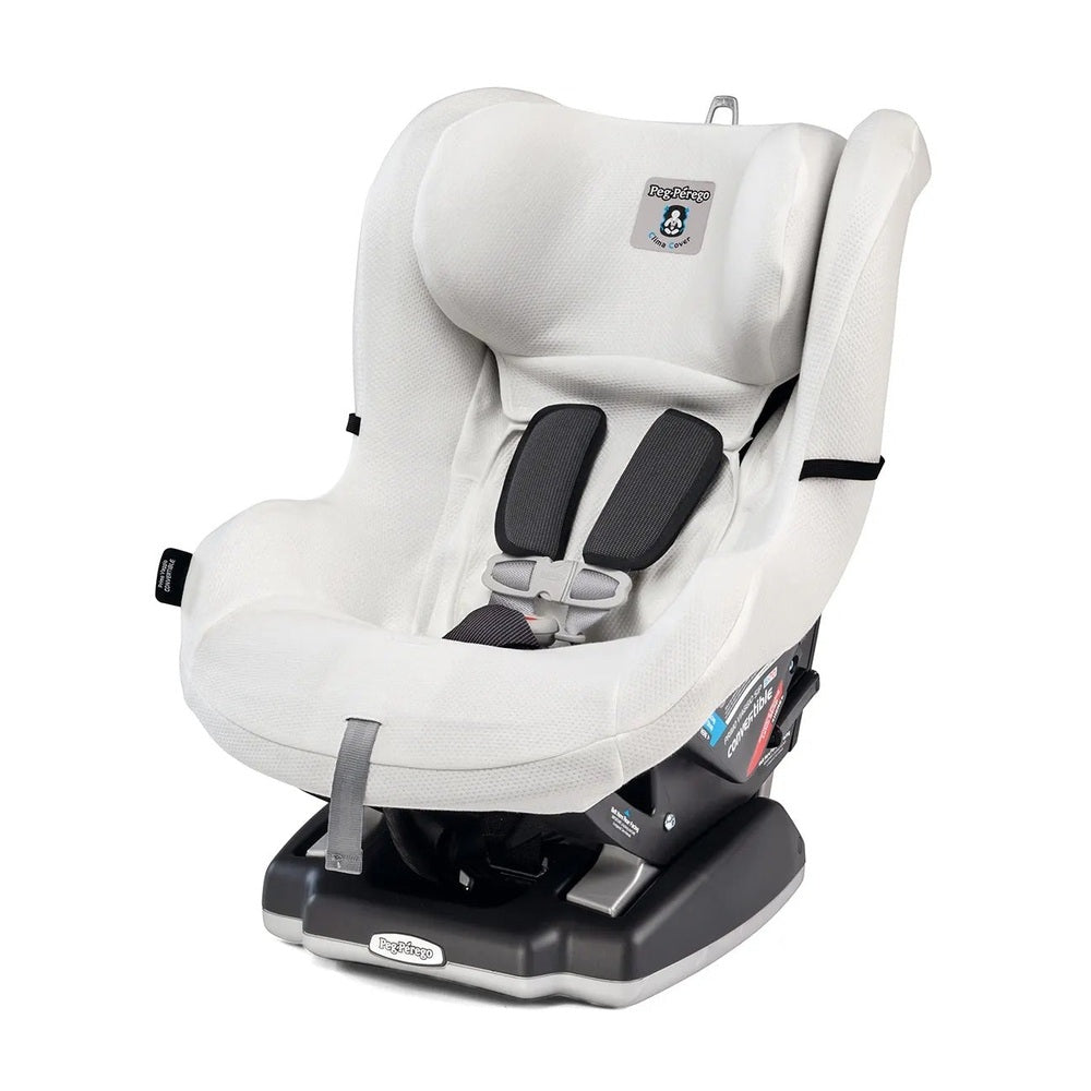 Peg Perego Clima Cover Convertible car seat in white fabric with padded straps fastened to the base.