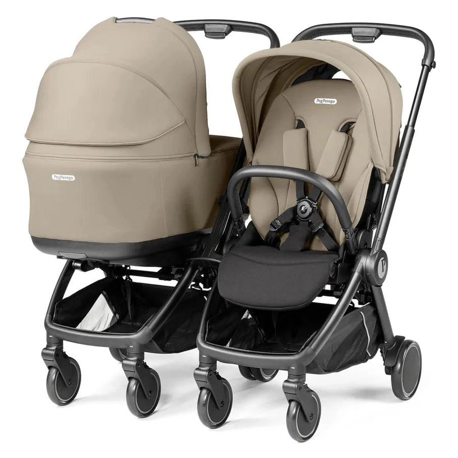 Peg Perego Duo Adapter for City Loop doubles a twin stroller with beige bassinet attached beside a beige seat.