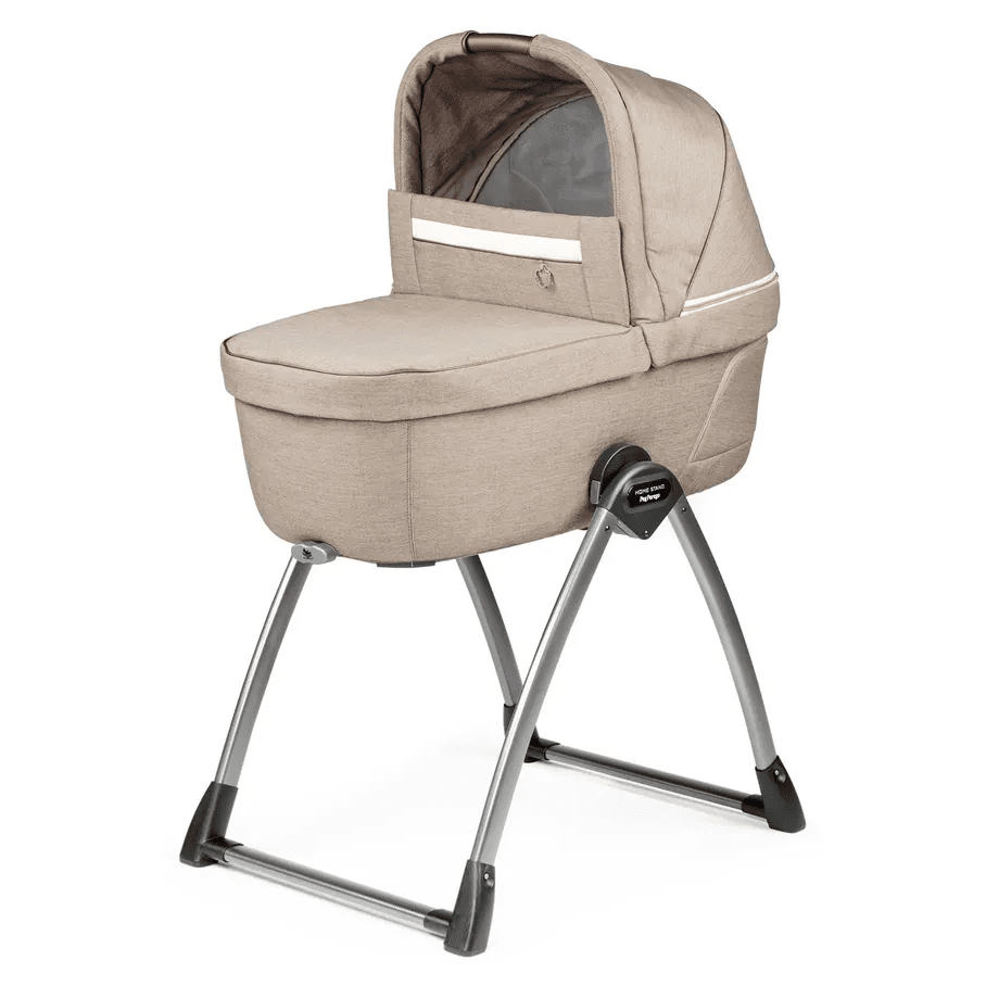Peg Perego Home Stand YPSI-Veloce-Vivace beige bassinet mounted securely on a sturdy metal stand.