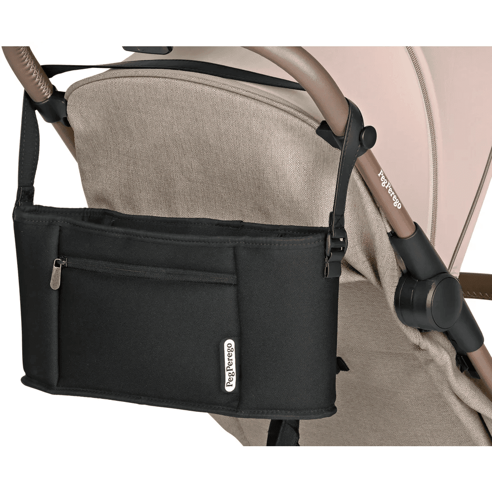 Peg Perego Organizer attached to a beige stroller, black fabric pouch with zipper pocket and brand tag visible.
