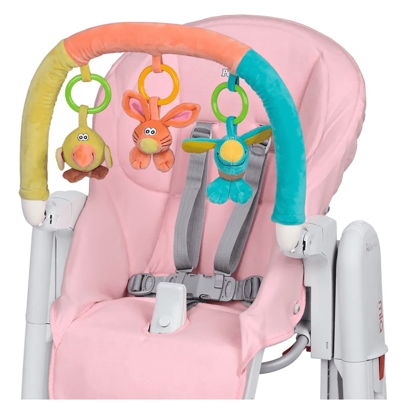 Peg Perego Play Bar overhead arch on a pink high chair with plush animals and colorful rings.