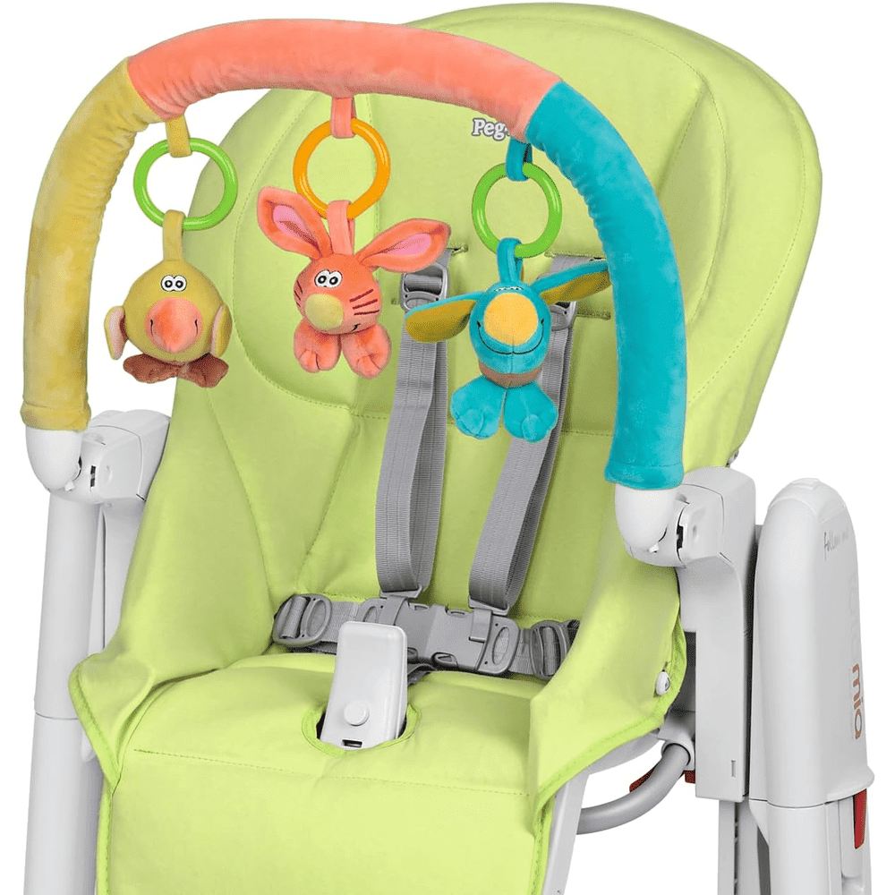 Peg Perego Play Bar attached to a lime high chair, colorful arches with hanging plush toys and rings.
