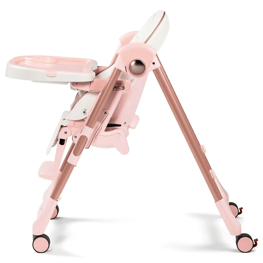 Peg Perego Prima Pappa Zero 3 High Chair in pink with extendable legs and tray, ready for use.