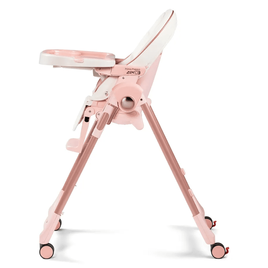 Peg Perego Prima Pappa Zero 3 high chair in pink with tray extended and foldable legs.