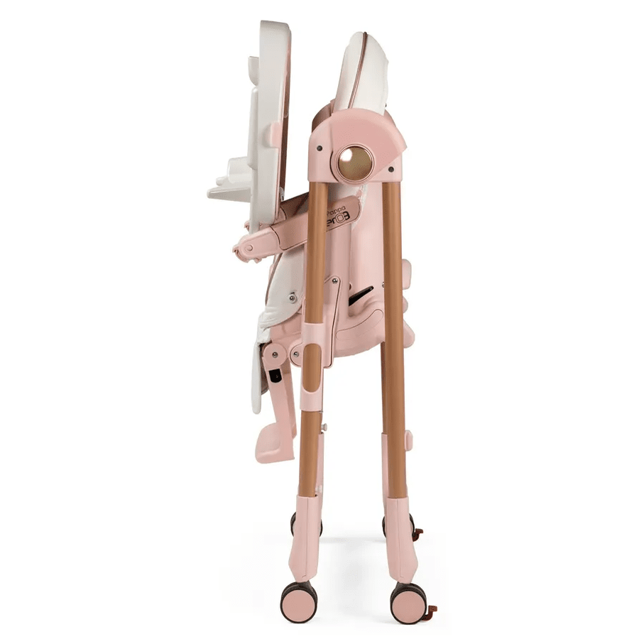 Peg Perego Prima Pappa Zero 3 High Chair in pink, folded upright on wheels for compact storage.