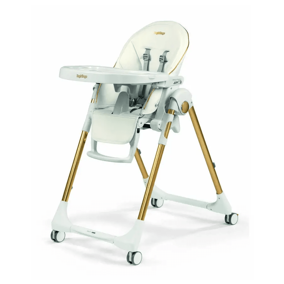 Peg Perego Prima Pappa Zero 3 high chair in ivory with gold legs, adjustable tray and harness.