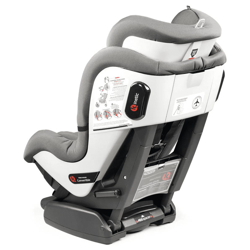 Peg Perego Primo Viaggio Convertible Car Seat Kinetic in white/gray, securely mounted on base with recline indicators visible.