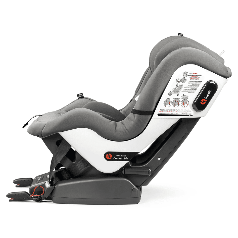 Peg Perego Primo Viaggio Convertible Car Seat Kinetic in gray, reclined on its sturdy base with instructional label visible.