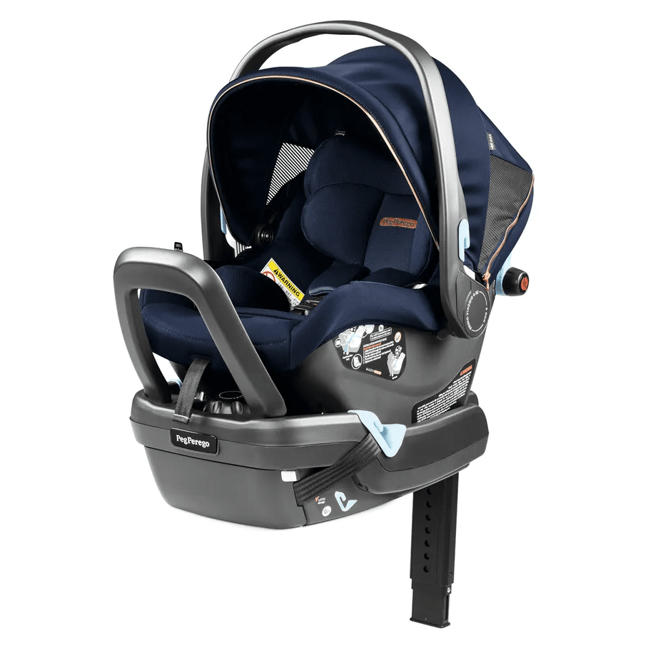 Peg Perego Primo Viaggio Nido infant car seat in navy, shown mounted on its base with adjustable leg support.