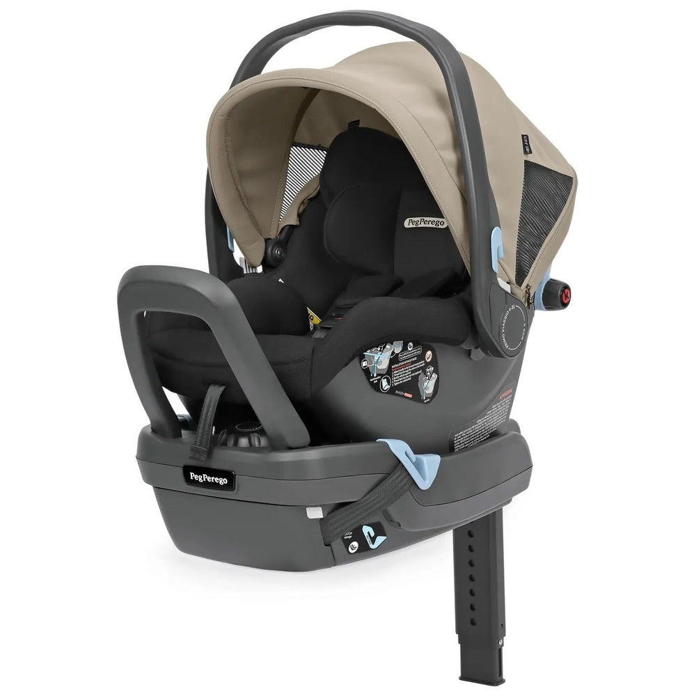 Peg Perego Primo Viaggio Nido infant car seat in beige/taupe with dark gray base and carry handle
