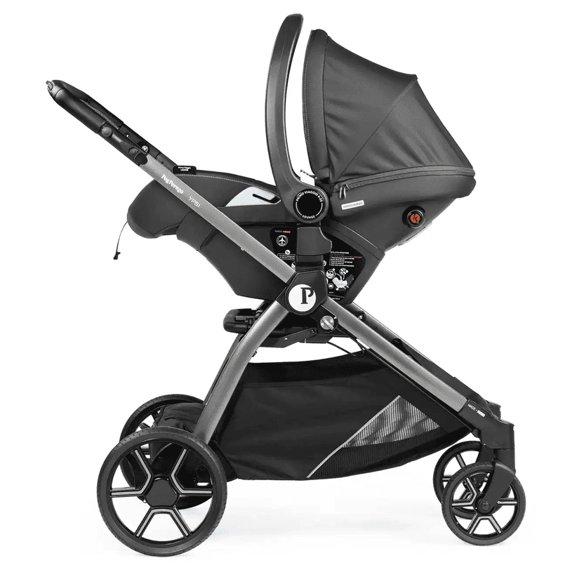 Peg Perego Primo Viaggio Nido infant car seat mounted on a sleek stroller frame with canopy and storage basket.