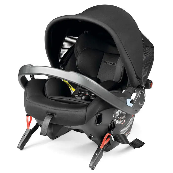 Peg Perego Primo Viaggio Urban Mobility infant car seat in black with sun canopy and curved carry handle.
