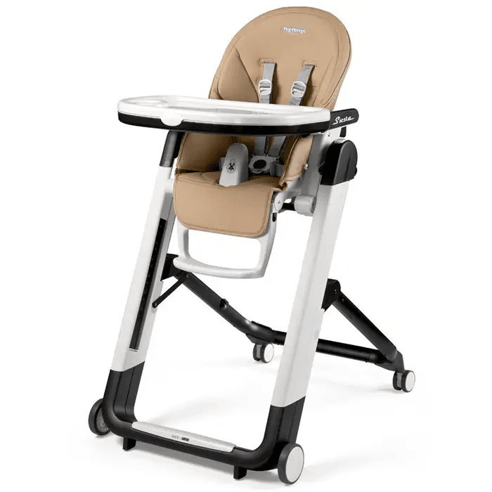 Peg Perego Siesta High Chair in beige upholstery with white frame, adjustable tray, and 5-point harness.