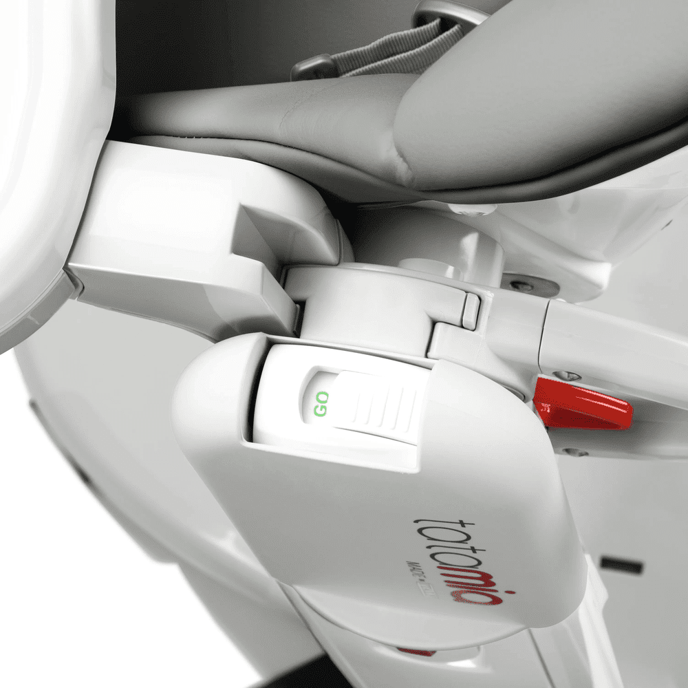 Peg Perego Tatamia High Chair, white/gray, with a green GO lever and reclining hinge in action.