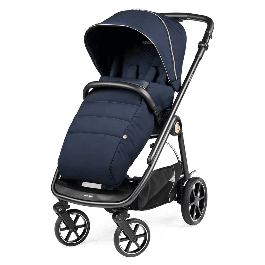 Peg Perego Veloce Stroller in navy with a foot muff, navy canopy, and sturdy black frame ready for a stroll.