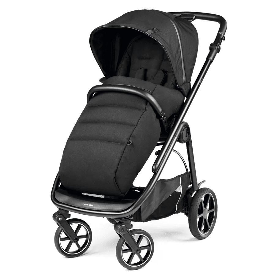 Peg Perego Veloce Stroller in black with foot muff, sun canopy, and four-wheeled frame.