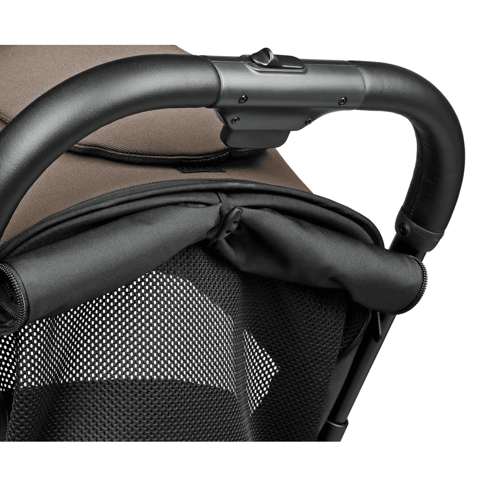 Peg Perego X-Country Travel Stroller handlebar in black with brown canopy and breathable mesh.