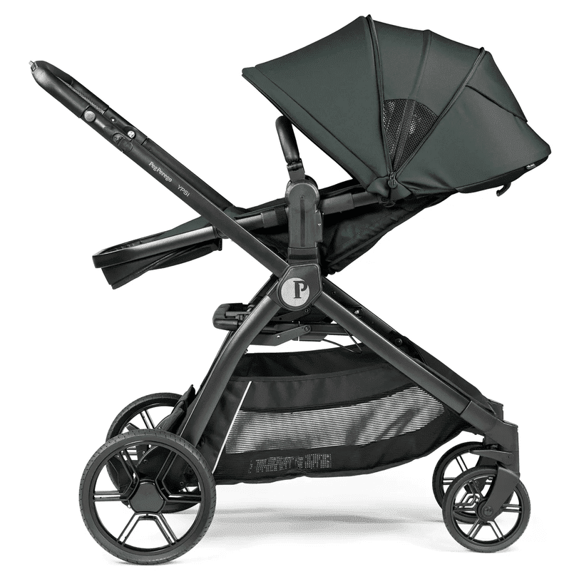 Peg Perego YPSI Travel System stroller in dark green canopy, black frame, and large storage basket (side view).