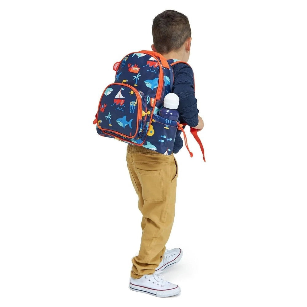 Penny Scallan stainless steel drink bottle for kids with white cap in a blue backpack side pocket